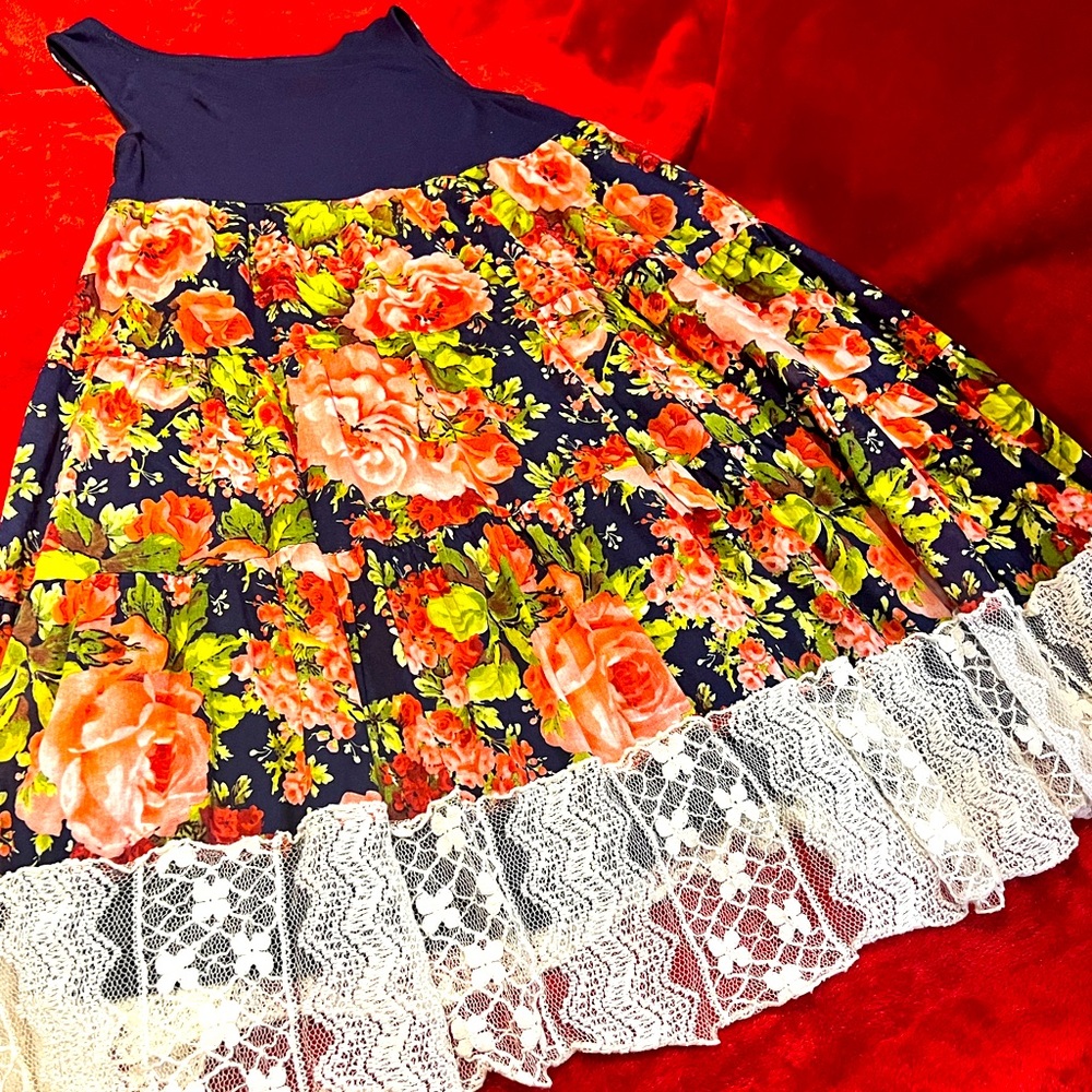 Beautifully made flower dress with white lace.